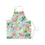 Eine Küchenschürze Garden Melody von Michel Design Works aus 100% Baumwolle.