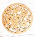Ein Untersetzer Round von NordDeco aus Holz 25cm.