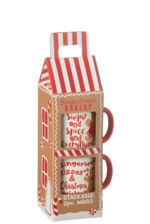 Gestapelte Weihnachtsbecher im Lebkuchenhaus-Design.